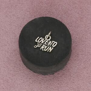 sterling silver love to run charm pendant